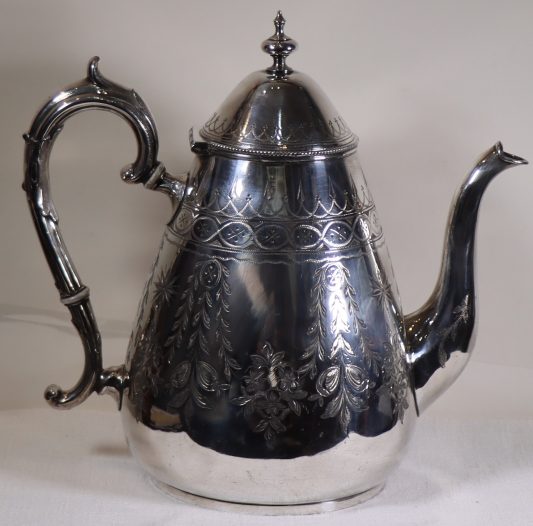 Silver Teapot with Engraved Design
