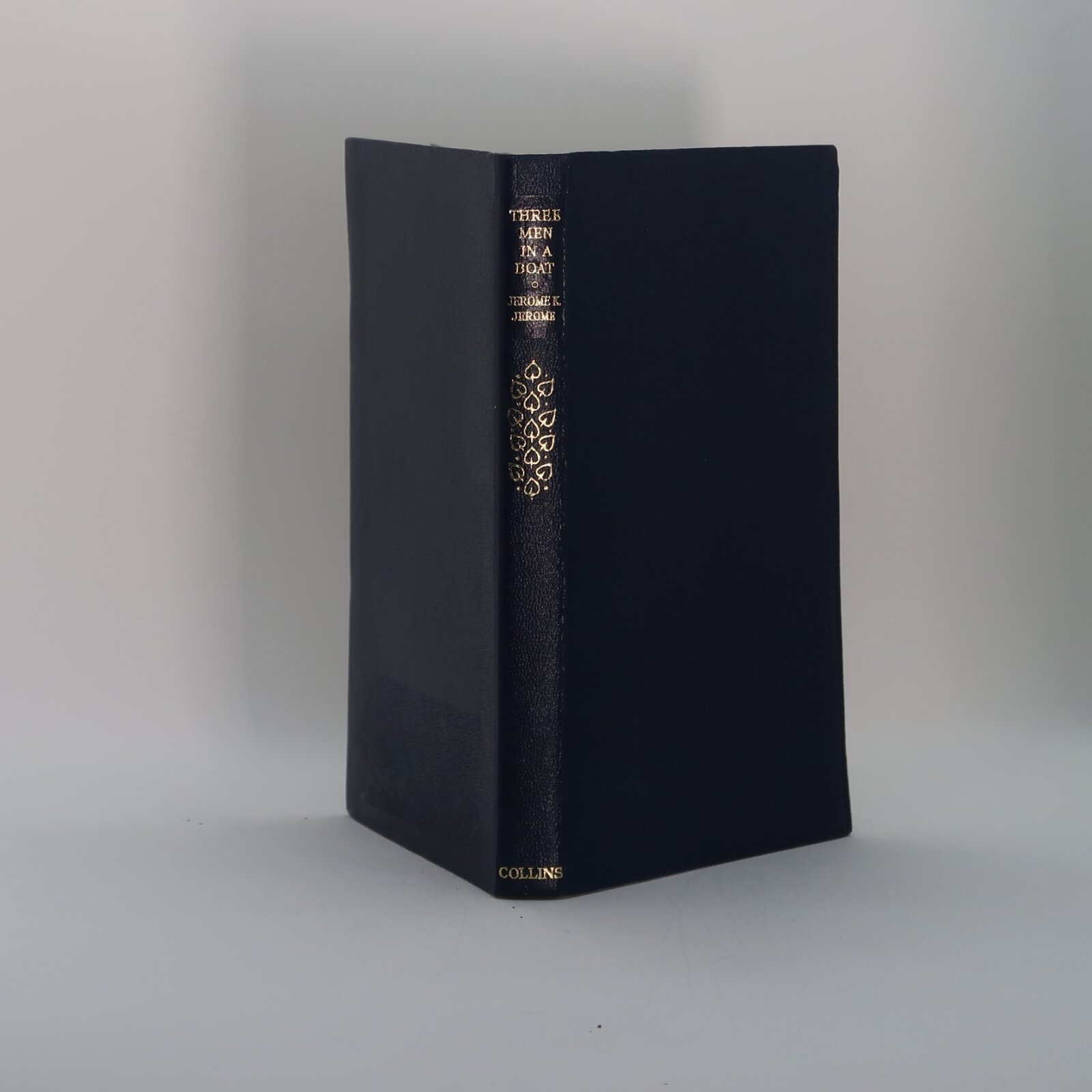 Photo of Three Men in a Boat.